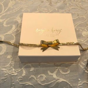 Gold hand beaded bow belt